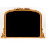 A 19th Century overmantel mirror, the gilt plaster frame with ribbon tie surmount,