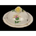 A Herend circular vegetable dish and cover painted flowers, the cover with rose finial,