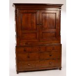 A George III oak and yew wood press cupboard,