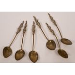 A set of six Japanese white metal spoons with dragon handles,