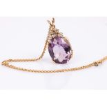 An amethyst and diamond pendant,