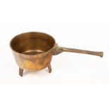 A brass skillet, the handle indistinctly signed and dated,