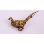 A late 19th Century 9ct yellow gold pheasant brooch,