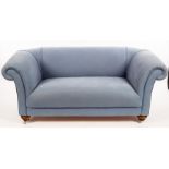 A modern two seater Chesterfield-type sofa, two armchairs and a footstool,