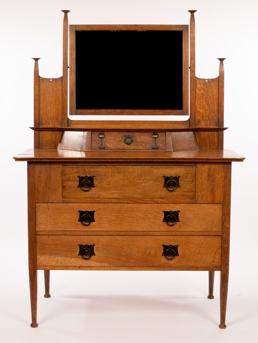 An Art Nouveau oak dressing table, retailed by Maple & Co,