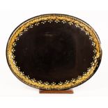 A 19th Century oval papier-mâché tray with gilded border and floret banded decoration,