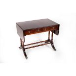A mahogany two-flap sofa table fitted two drawers,