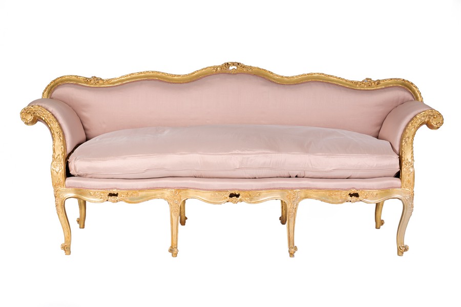 A French carved gilt wood canape of Louis XV design,