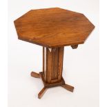 An Arts & Crafts style octagonal oak occasional table, on square column, 50.