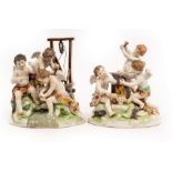 A pair of 19th Century Samson figure groups, industrious cherubs, three beside an anvil,