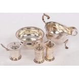 A silver cruet, RE Stone, London 1949, a sugar bowl, Birmingham 1912 and a sauce boat,