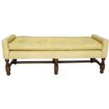 A Baroque style suede upholstered bench