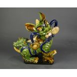 Chinese green glazed fu lion form roof tile
