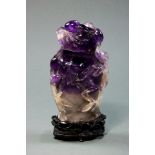 Chinese amethyst covered urn with a vintage stand