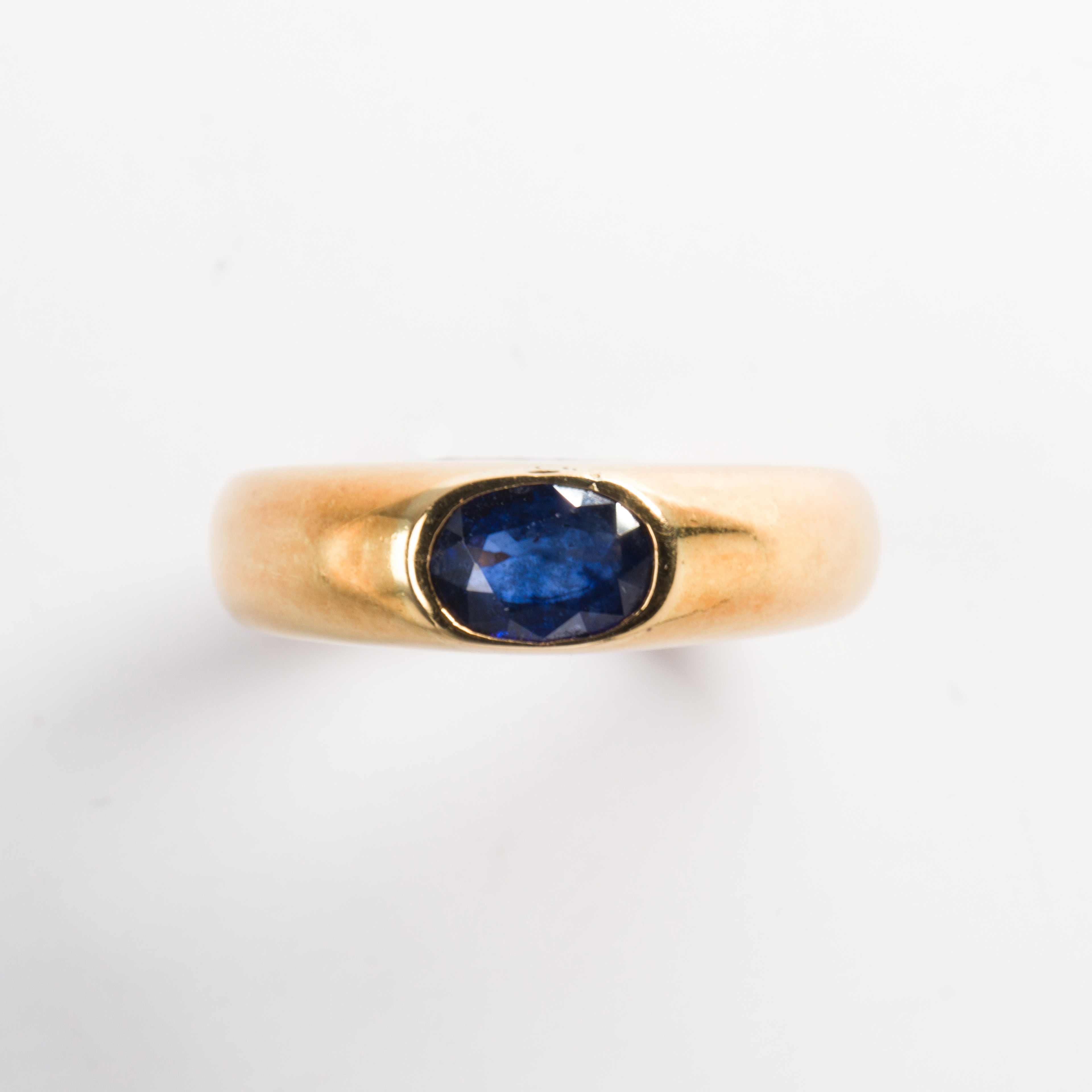 A sapphire and eighteen karat gold ring