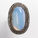 An opal, diamond and blackened silver ring