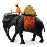 A Hamlin's Wizard Oil paper mache elephant advertising store display figure