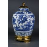 A Chinese Ming style blue and white jar with brass lid