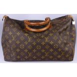 A Louis Vuitton style handbag