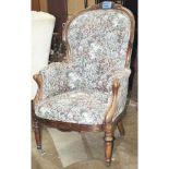 A Victorian Rococo Revival rosewood armchair