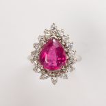 A tourmaline, diamond and fourteen karat white gold ring