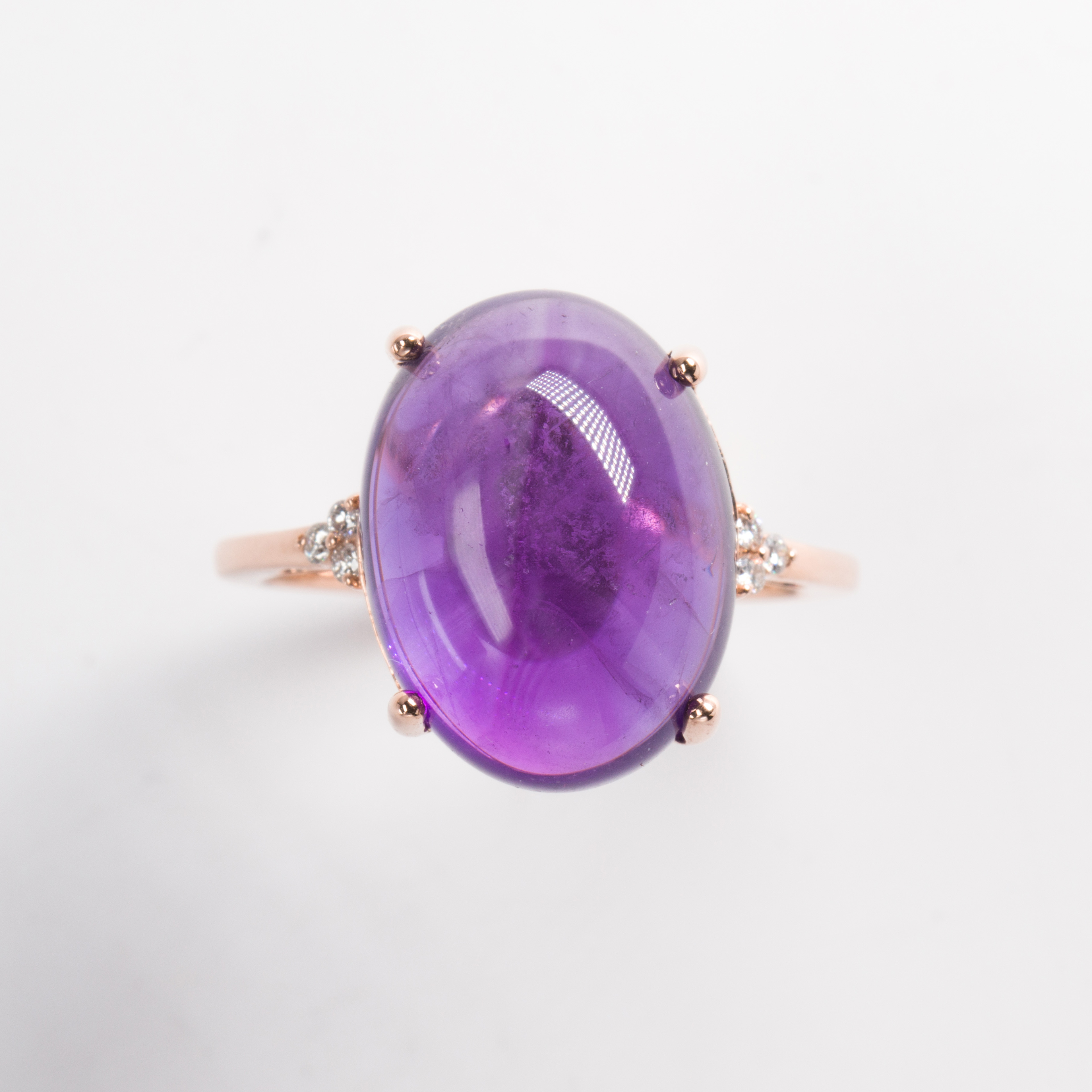 An amethyst, diamond and fourteen karat gold ring