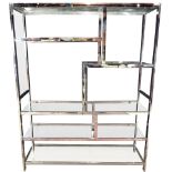 A Milo Baughman style chrome and glass etagere