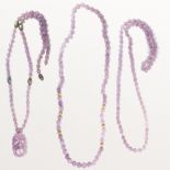 A group of amethyst bead necklaces