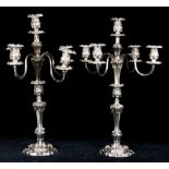 A massive pair European silver plated five light candelabra