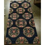 Chinese rug with floral hexagonal panels