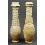An associated pair of Yuan Yingjing funerary urns