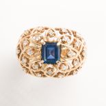 A sapphire, diamond and fourteen karat gold ring