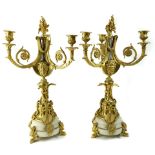 A pair of Rococo style gilt bronze candelabras