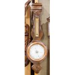 English barometer having two windows centering the banjo form mahogany case