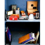 Two shelves of Russian and laquerware and decorative items