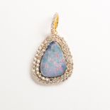 A black opal, diamond and eighteen karat gold pendant