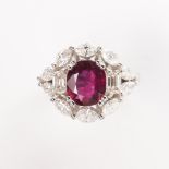 A ruby, diamond and fourteen karat gold ring