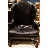 Chesterfield style wing back leather chair