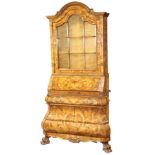 A Baroque style marquetry decorated secretary bookcase