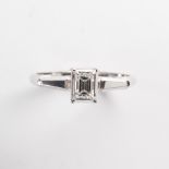 A diamond and eighteen karat white gold ring