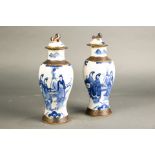 Pair of Chinese blue and white crackle glazed covered vases