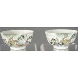 A pair of Chinese Famille Rose figural bowls