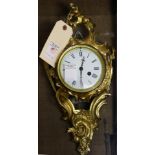 A French gilt bronze wall clock circa 1890 in the Rococo taste