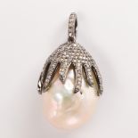 A South Sea pearl, diamond and blackened silver pendant