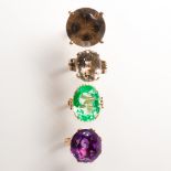 A group of gemstone and fourteen karat white or yellow gold rings