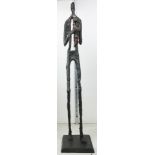 An abstract figural metal sculpture