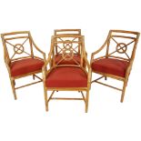 A group of McGuire, San Francisco armchairs