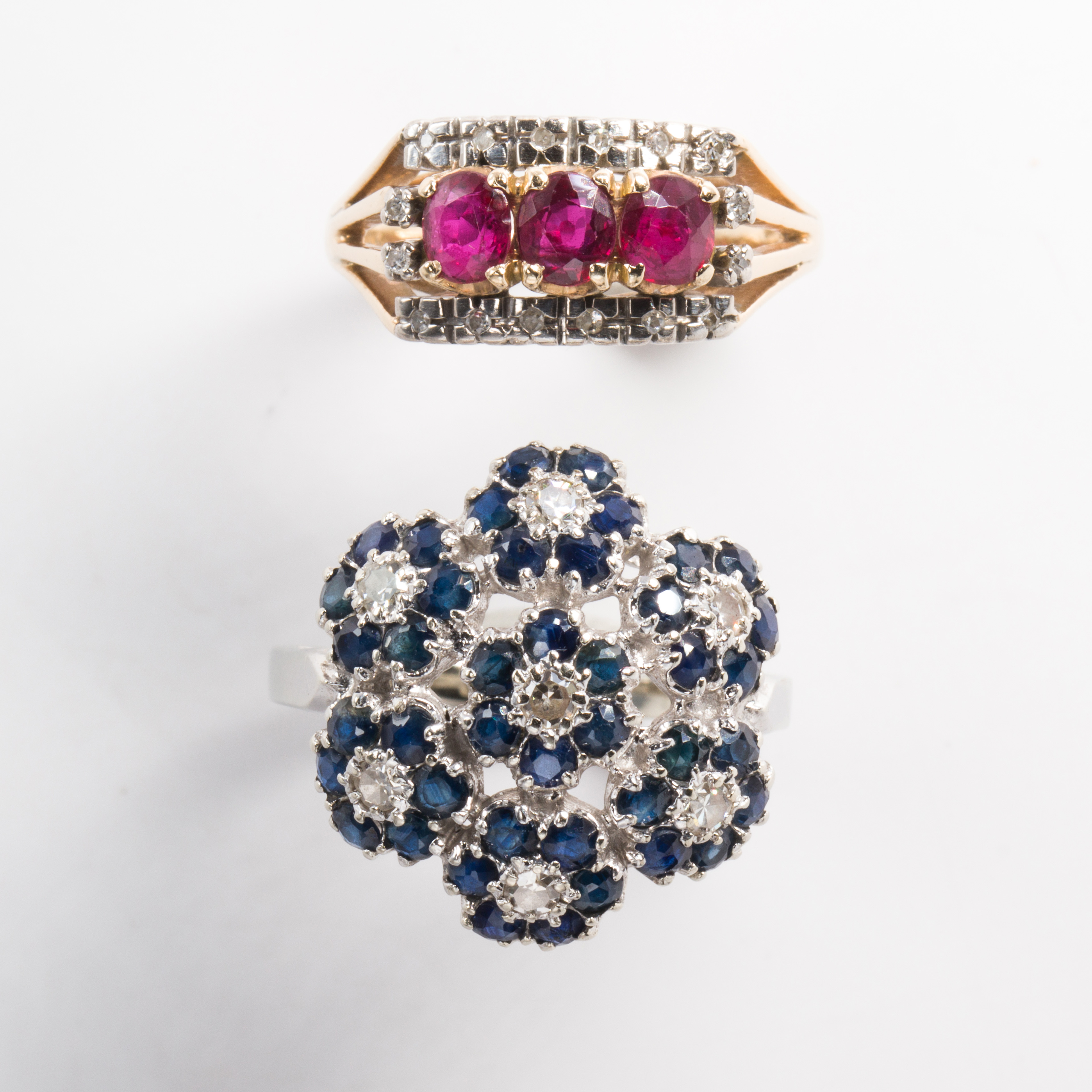 A group of sapphire, ruby, diamond and fourteen karat gold rings