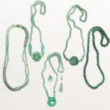 A group of aventurine and jade jewelry