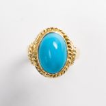 An Eyptian turquoise and eighteen karat gold ring